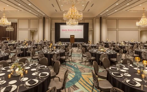 a room with tables set for a meal