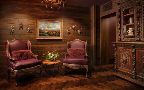 a room with chairs and a table