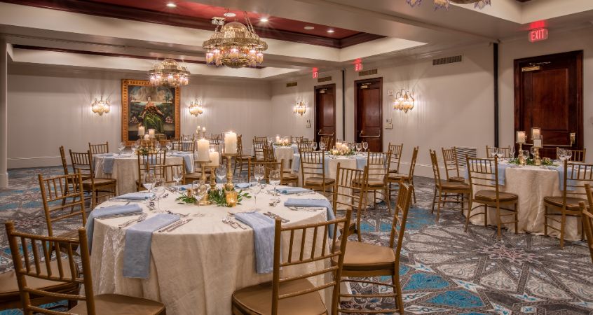 a room with tables and chairs