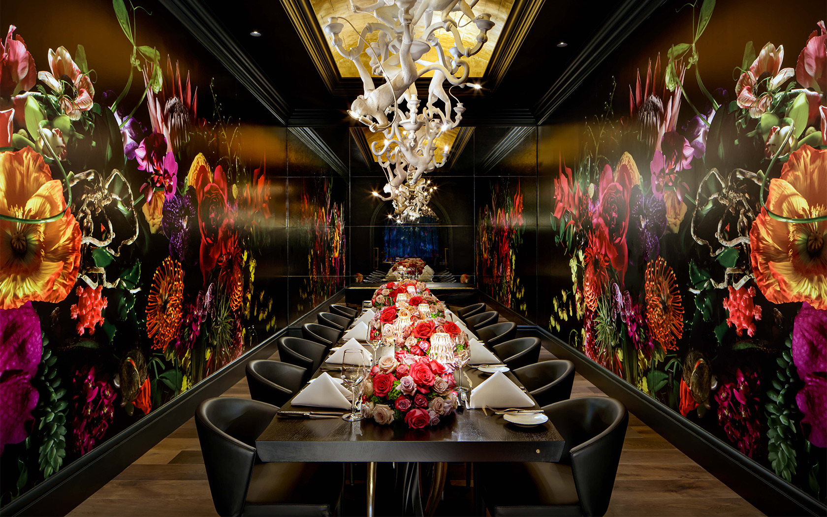 Table with chairs and floral art