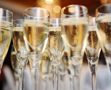 a group of champagne glasses
