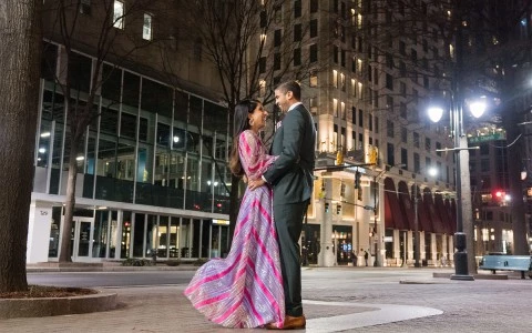 Wedding couple in the city streets at night 