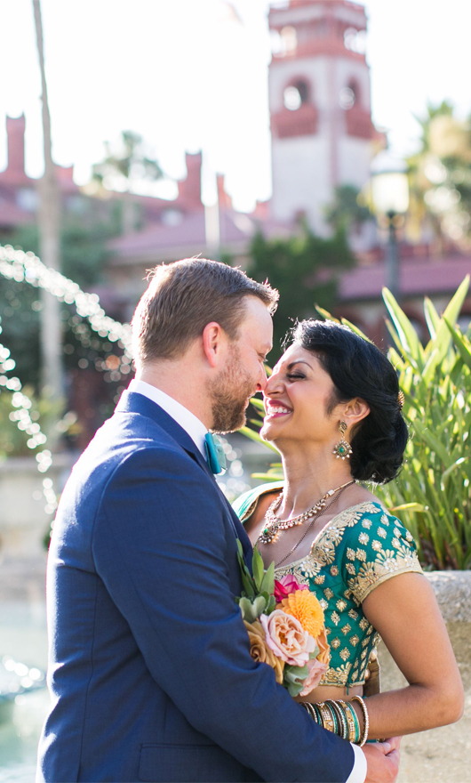 man and women smiling and kissing