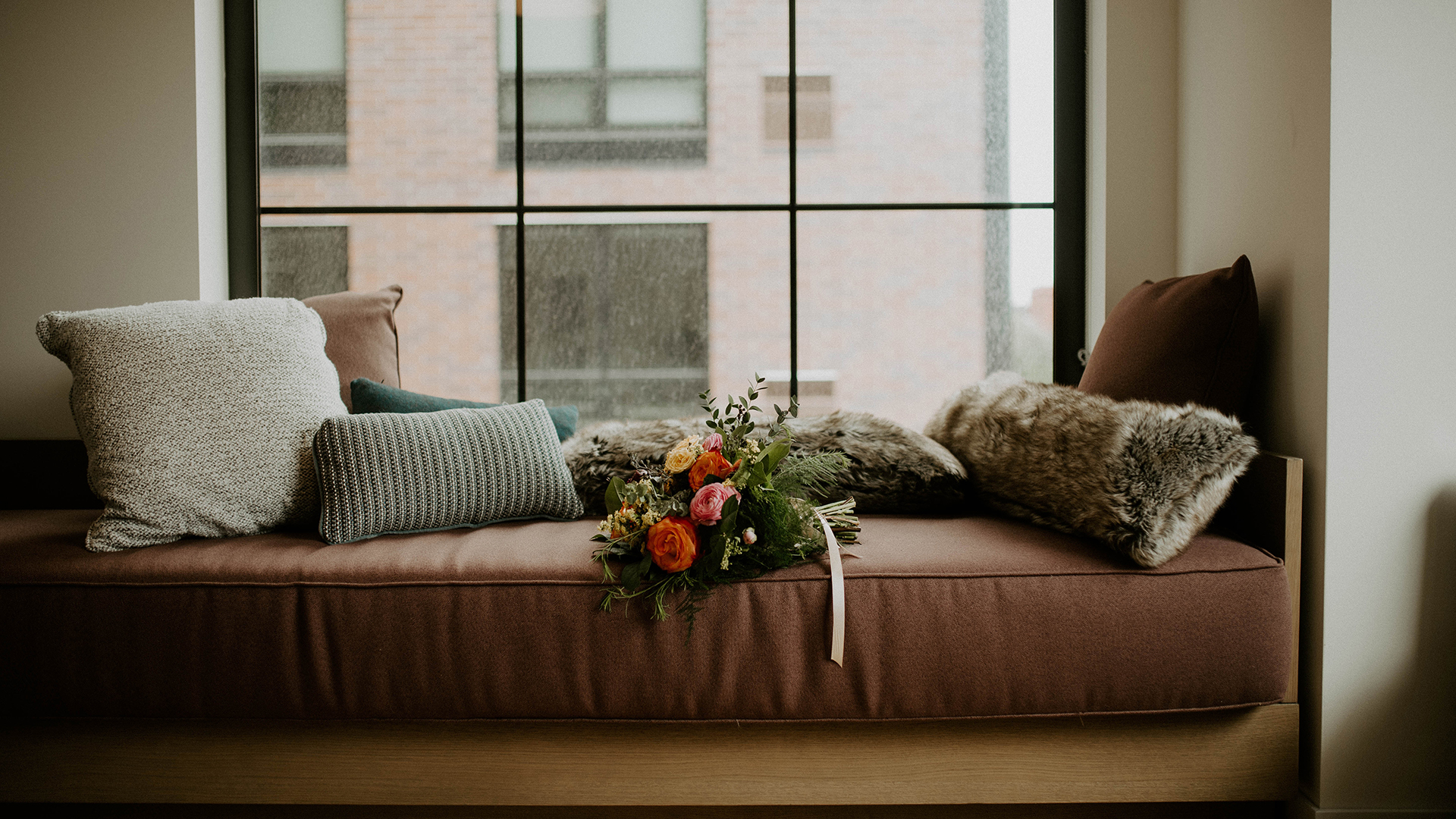 A couch in front of the window