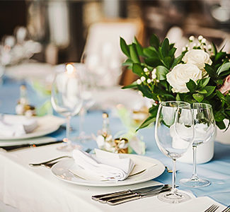 a table with plates and glasses