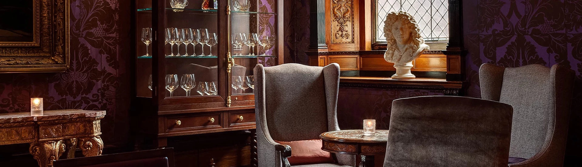 cushioned chair in dimly lit room