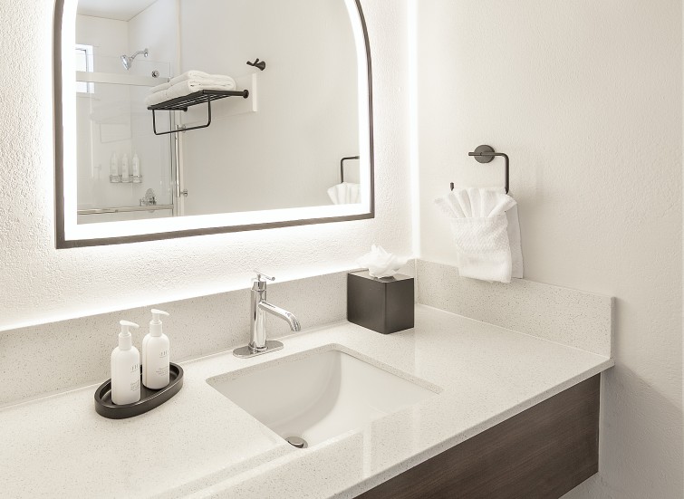 a bathroom with a mirror