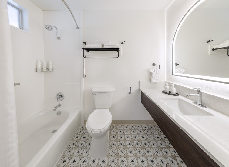 a bathroom with a sink and toilet