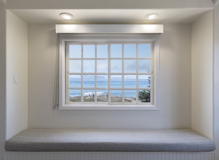a window with a view of the ocean