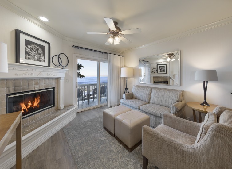 a living room with a fireplace and a couch