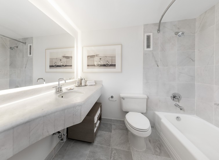 a bathroom with a sink toilet and bathtub