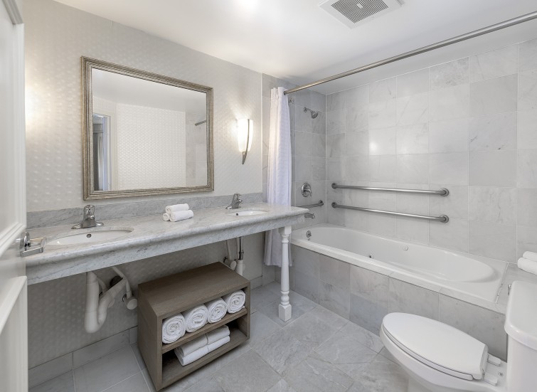 a bathroom with a sink toilet and bathtub