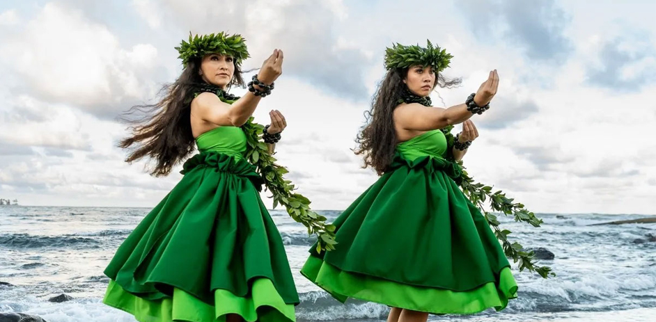 a woman in green dresses and a wreath of leaves on her head