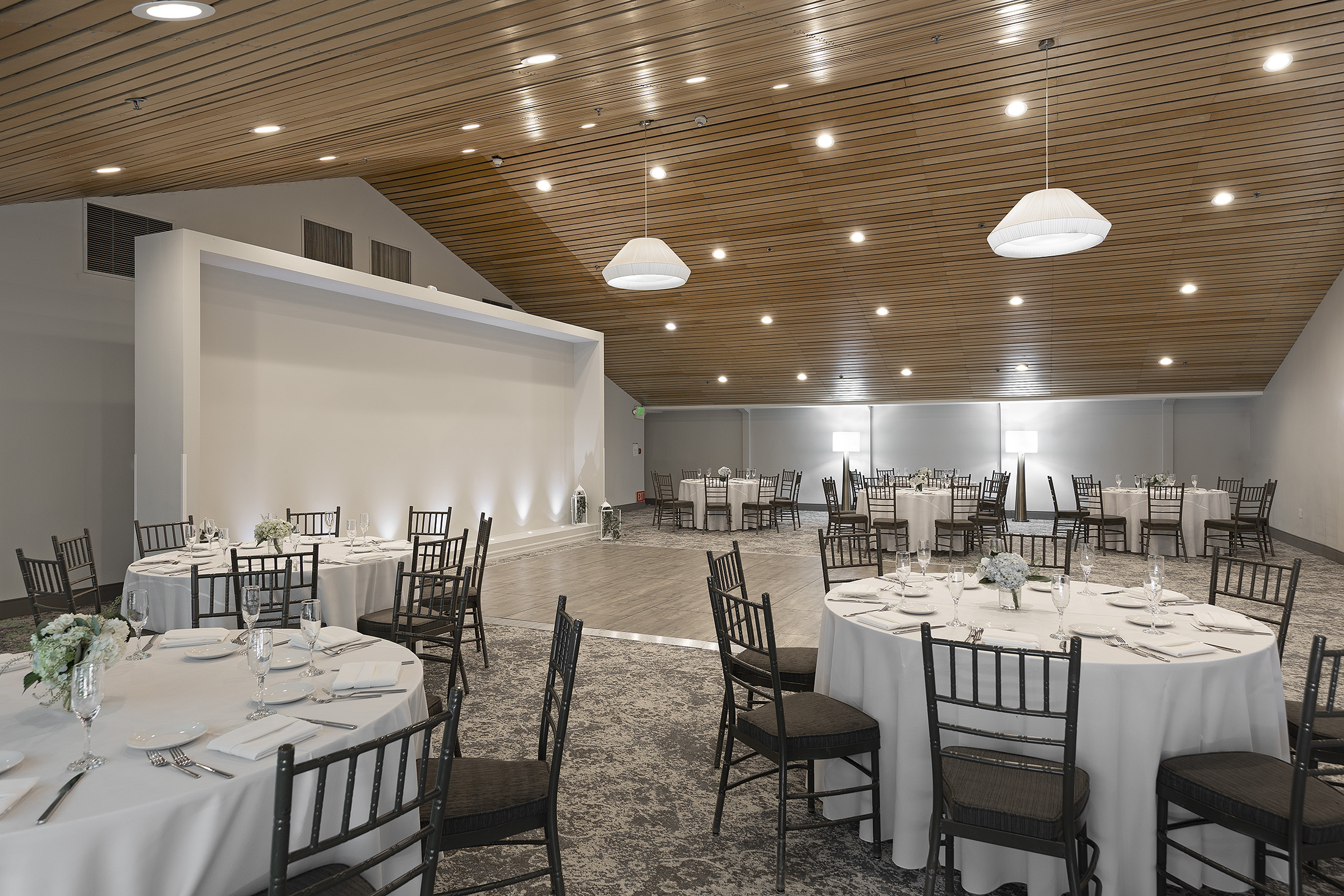 a room with tables and chairs