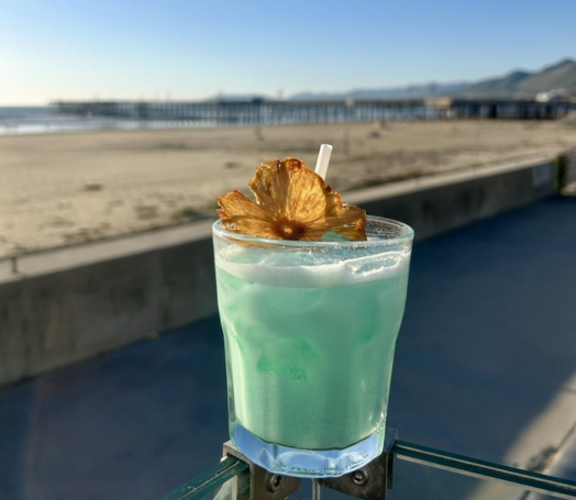 a drink with a flower on top of it