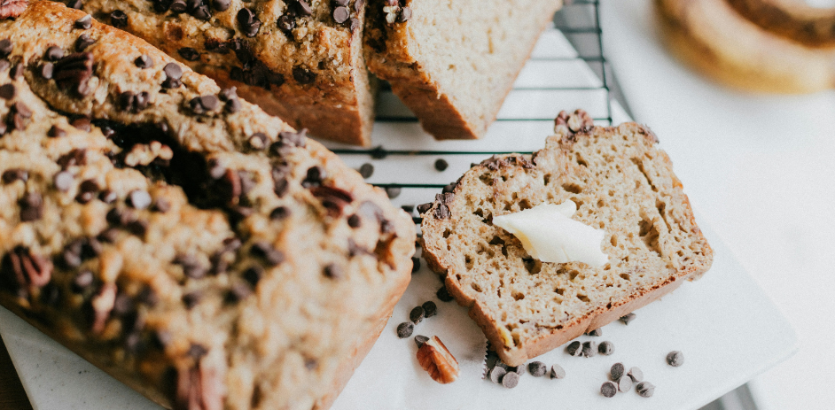 a loaf of bread with butter on top