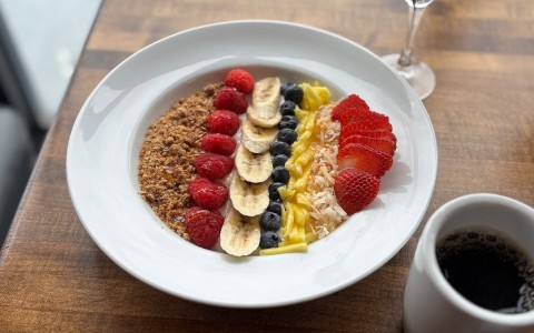 a bowl of fruit and cereal