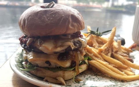 a burger and fries on a plate