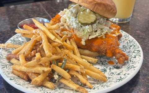 a plate of food with a sandwich and fries