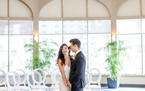 the newly wedded couple taking some pictures in their decorated venue