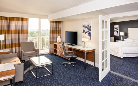 a room with a television and a chair