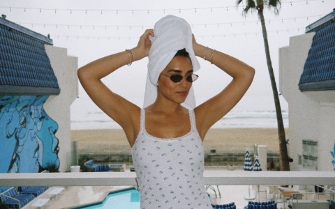 a woman with a towel on her head