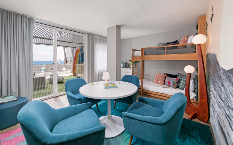a room with a table and chairs