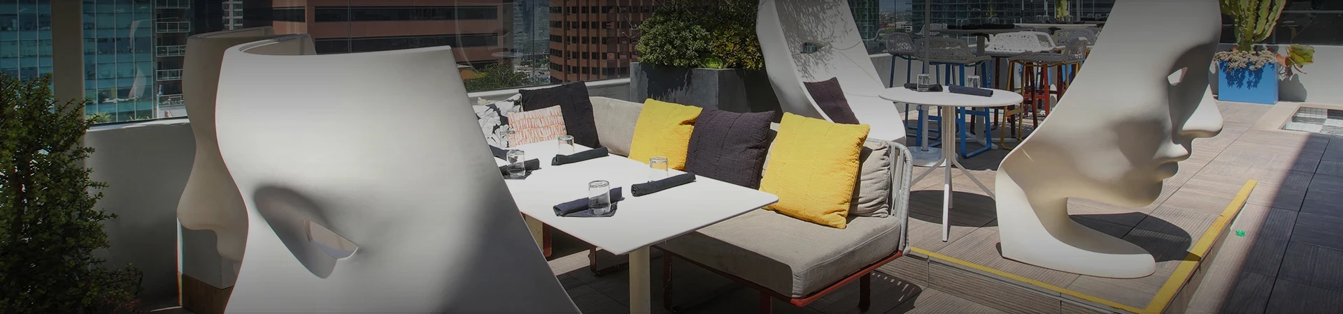 a table with pillows and napkins on it