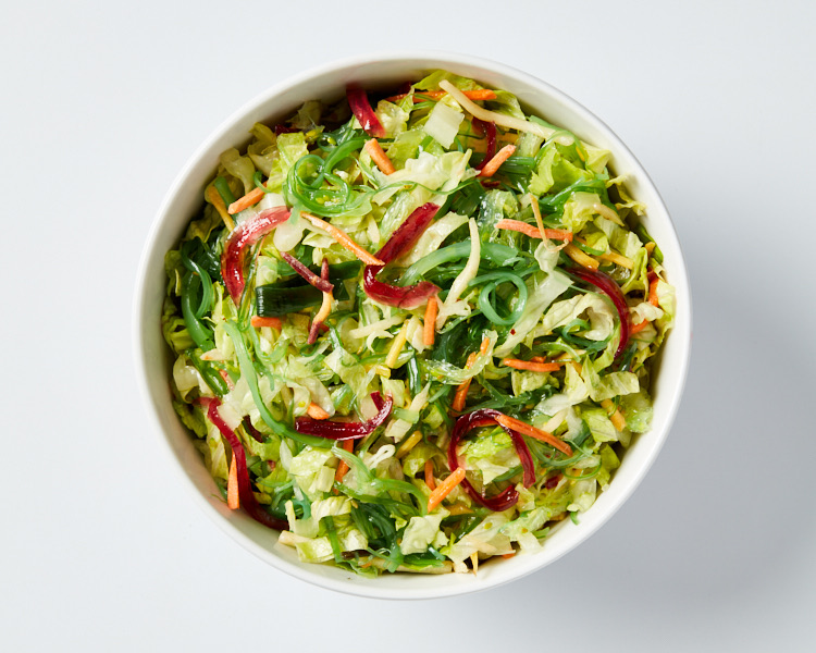 salad with seaweed salad, onions, carrots