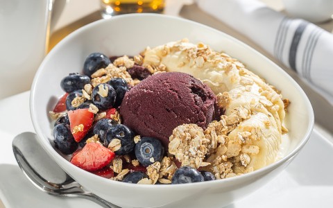 a bowl of fruit and oatmeal