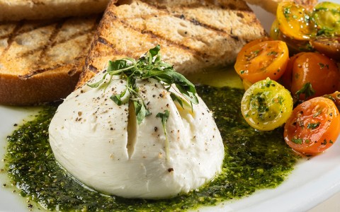 a plate of food with toast and cheese