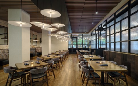 a room with tables and chairs