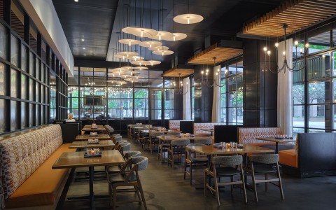 a restaurant with tables and chairs