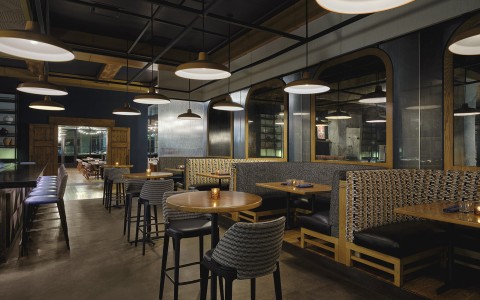 a restaurant with tables and chairs