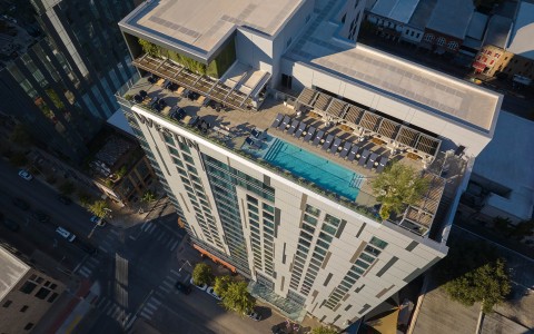 a building with a pool on top of it