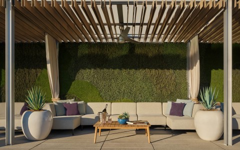 a patio with a couch and a table