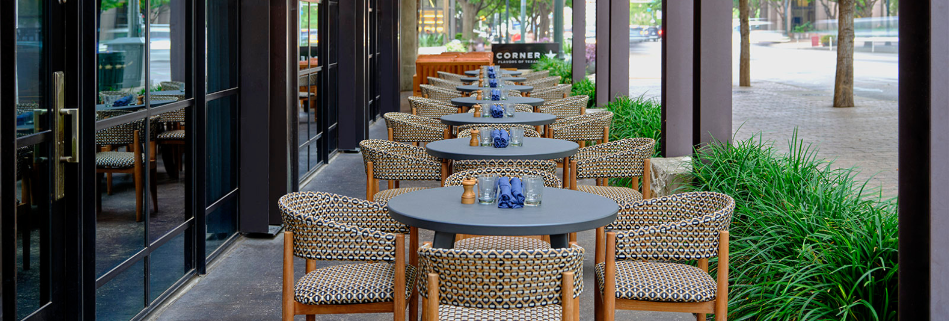 a row of tables and chairs