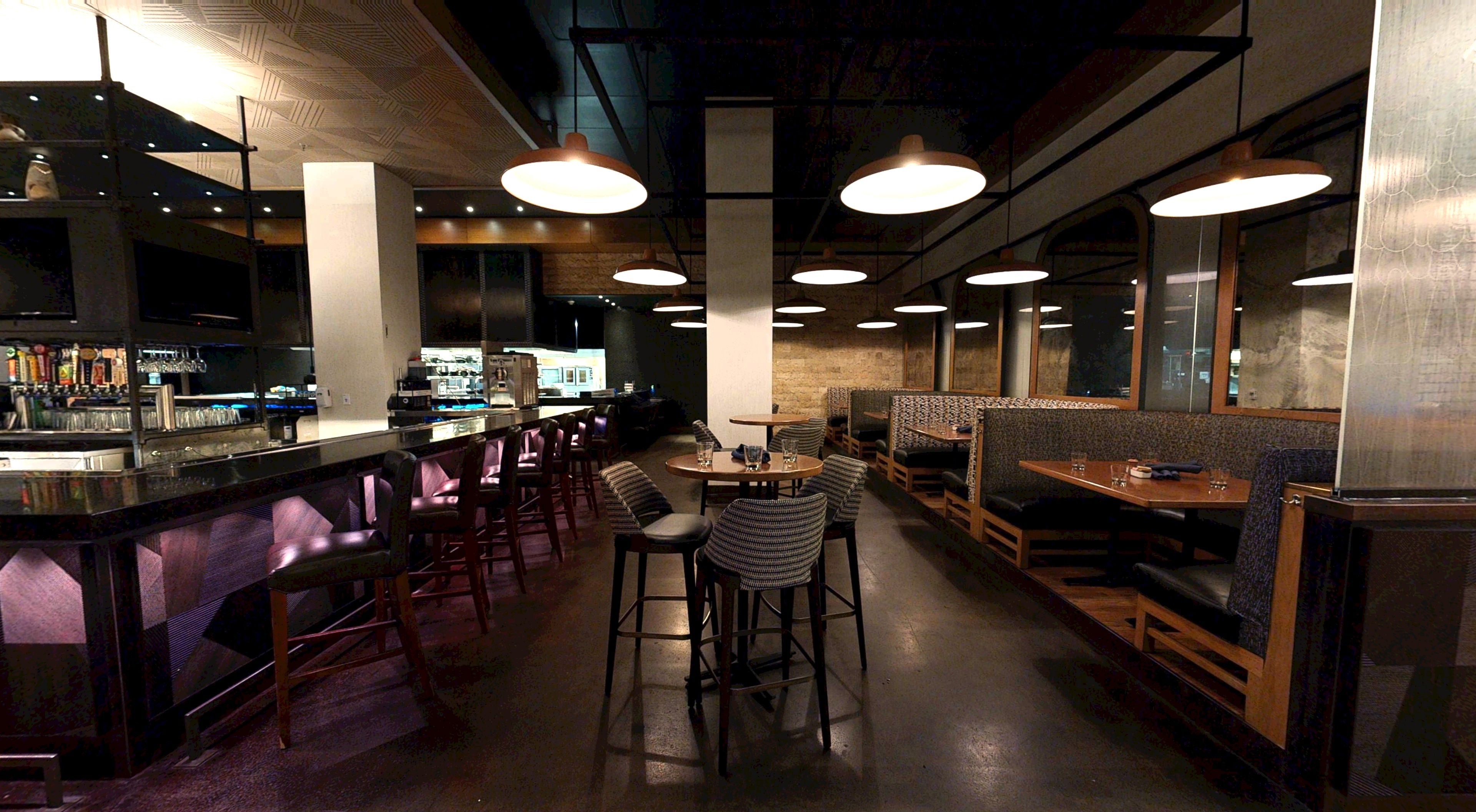 a restaurant with tables and chairs