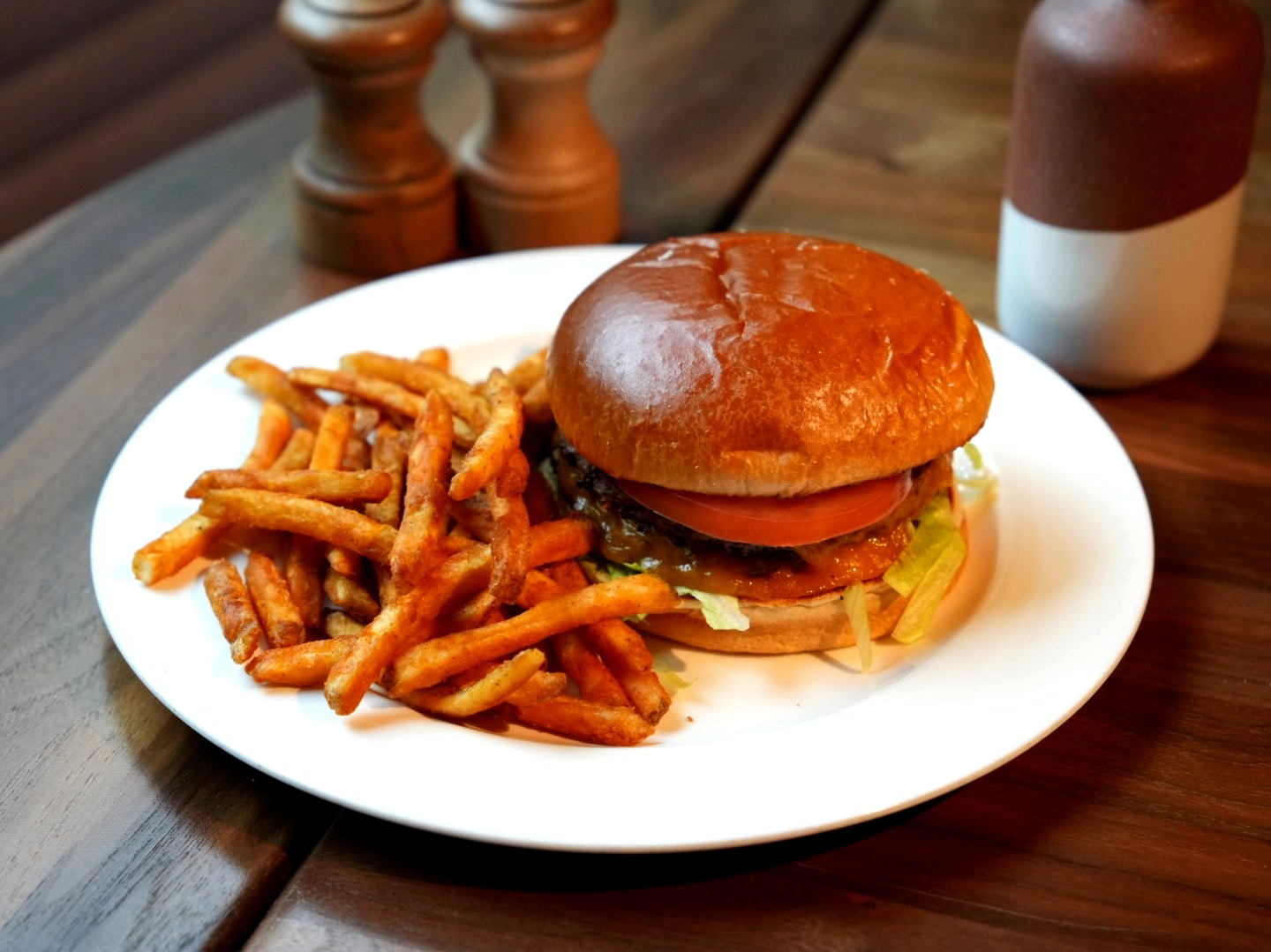 a burger and fries on a plate