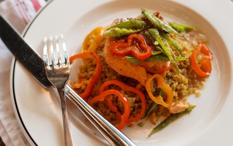 a plate of food with fork and knife