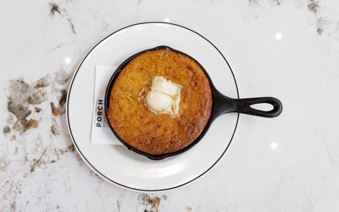 a skillet with butter on top of it