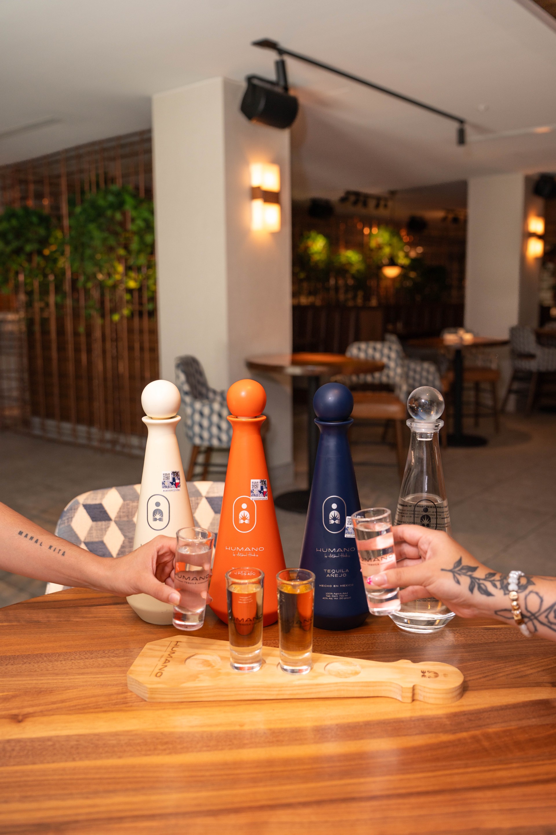 a group of glasses of alcohol on a table