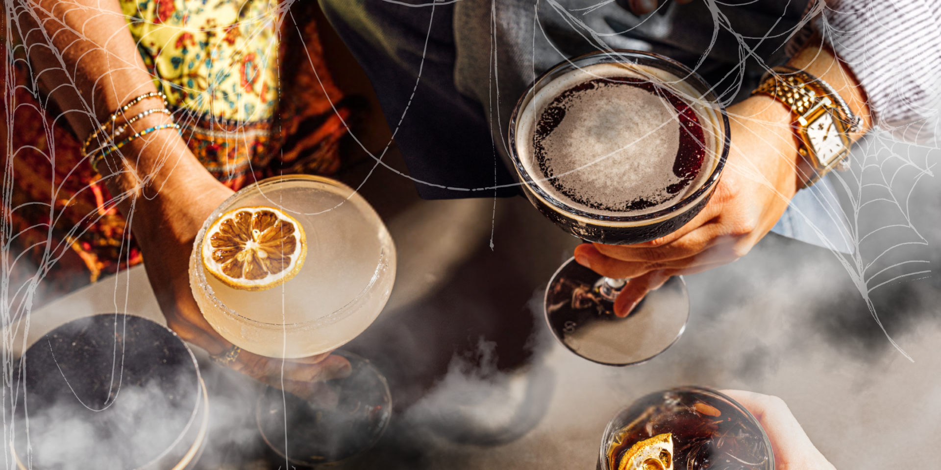 a group of glasses with liquid and lemon slices