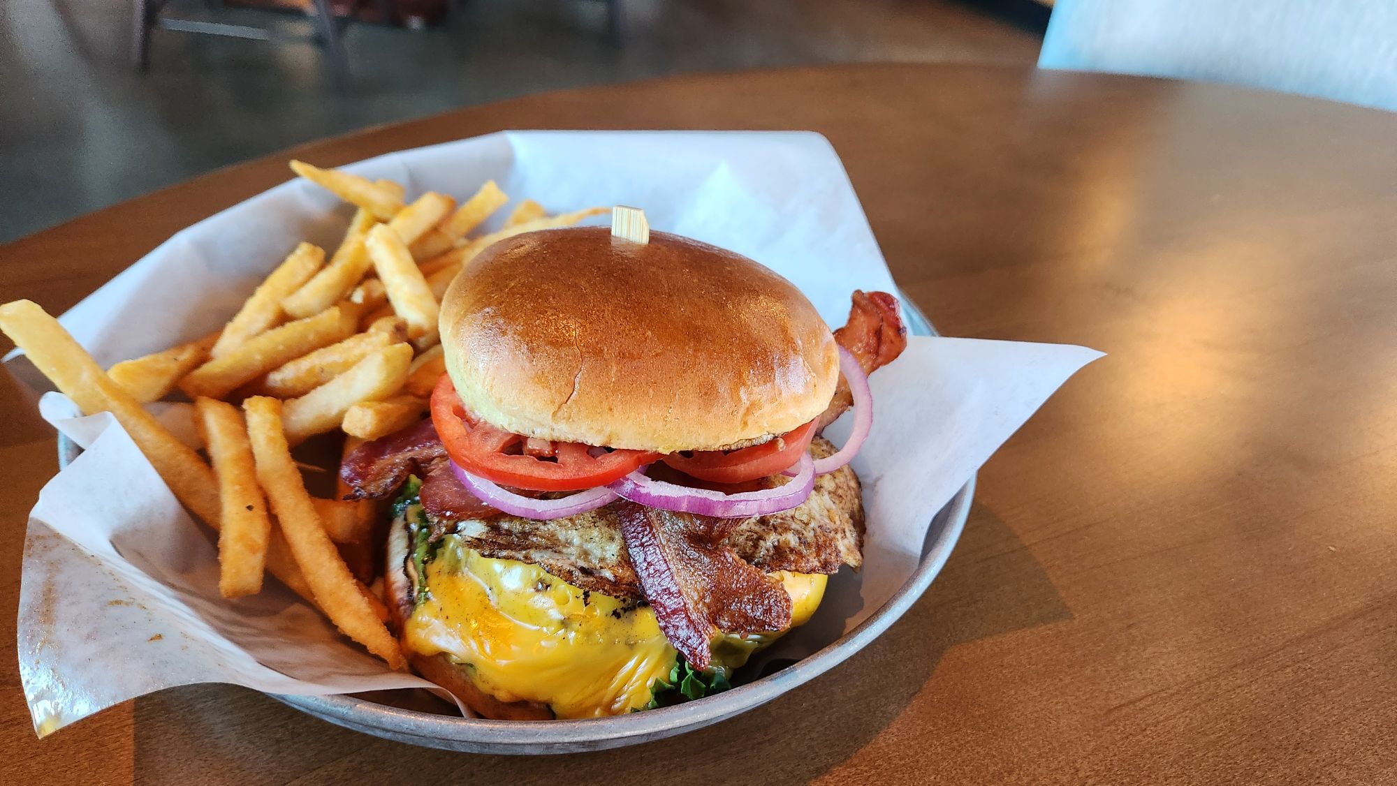 a burger and fries on a plate