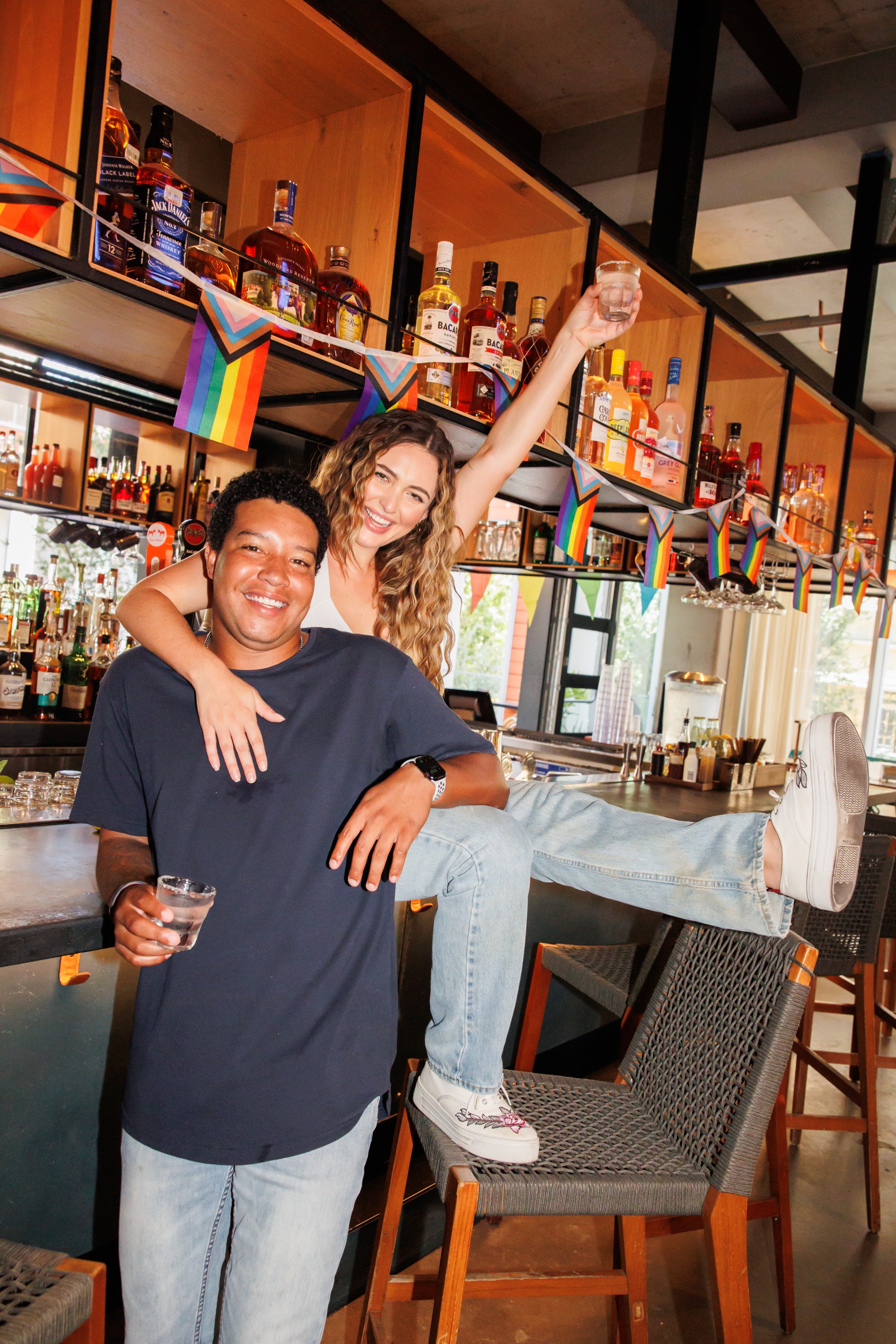 a man sitting on a man's lap