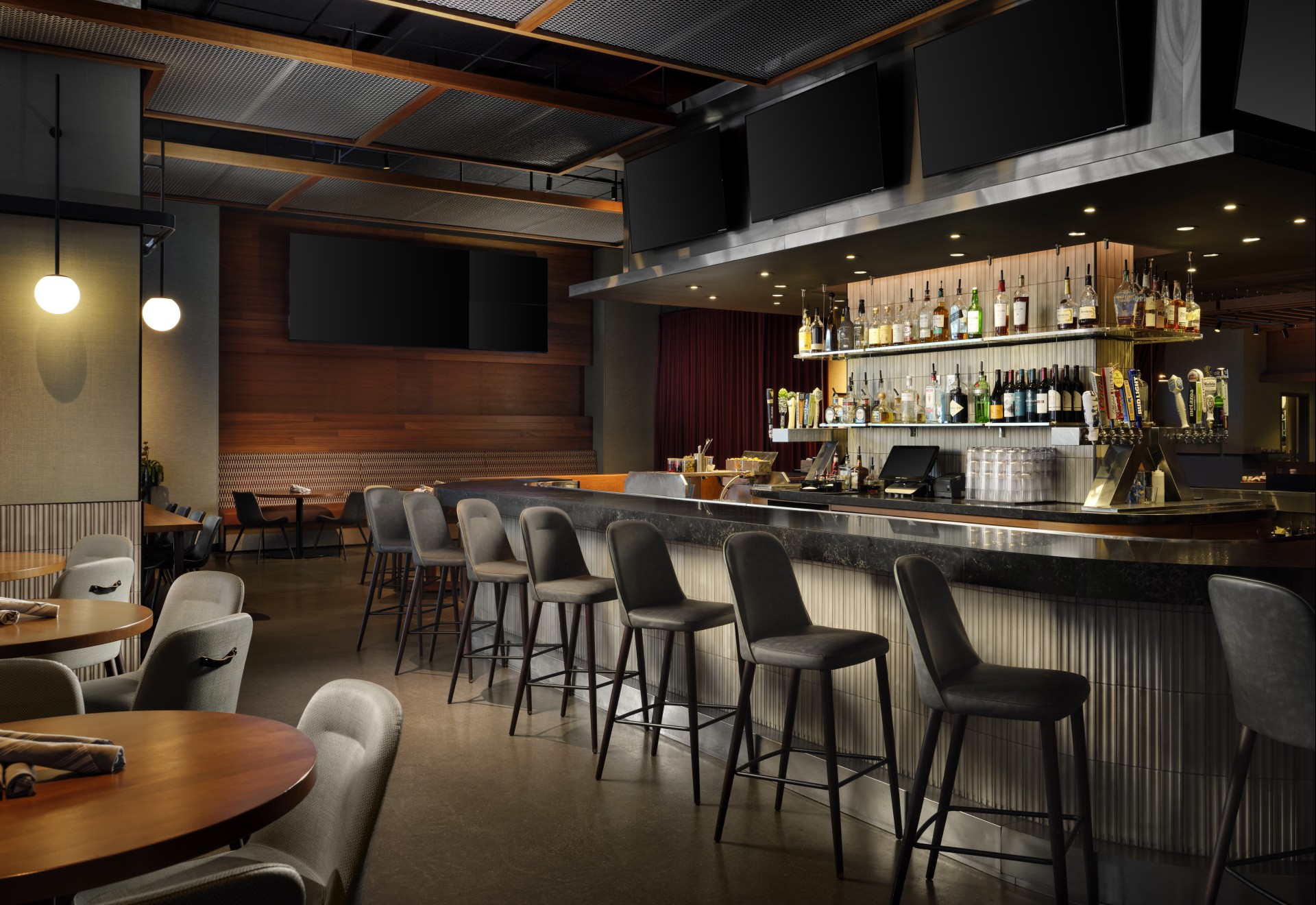 High Velocity bar with tables and hightop chairs