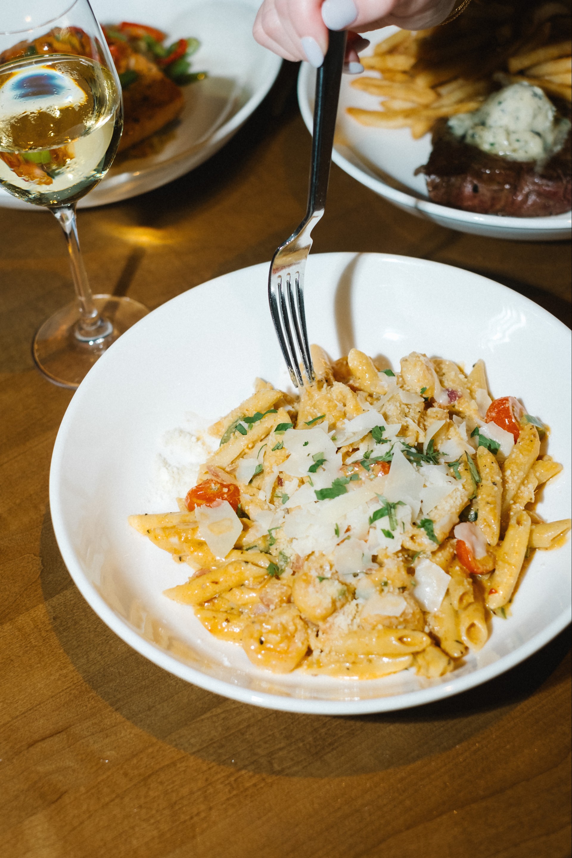a plate of pasta with a fork