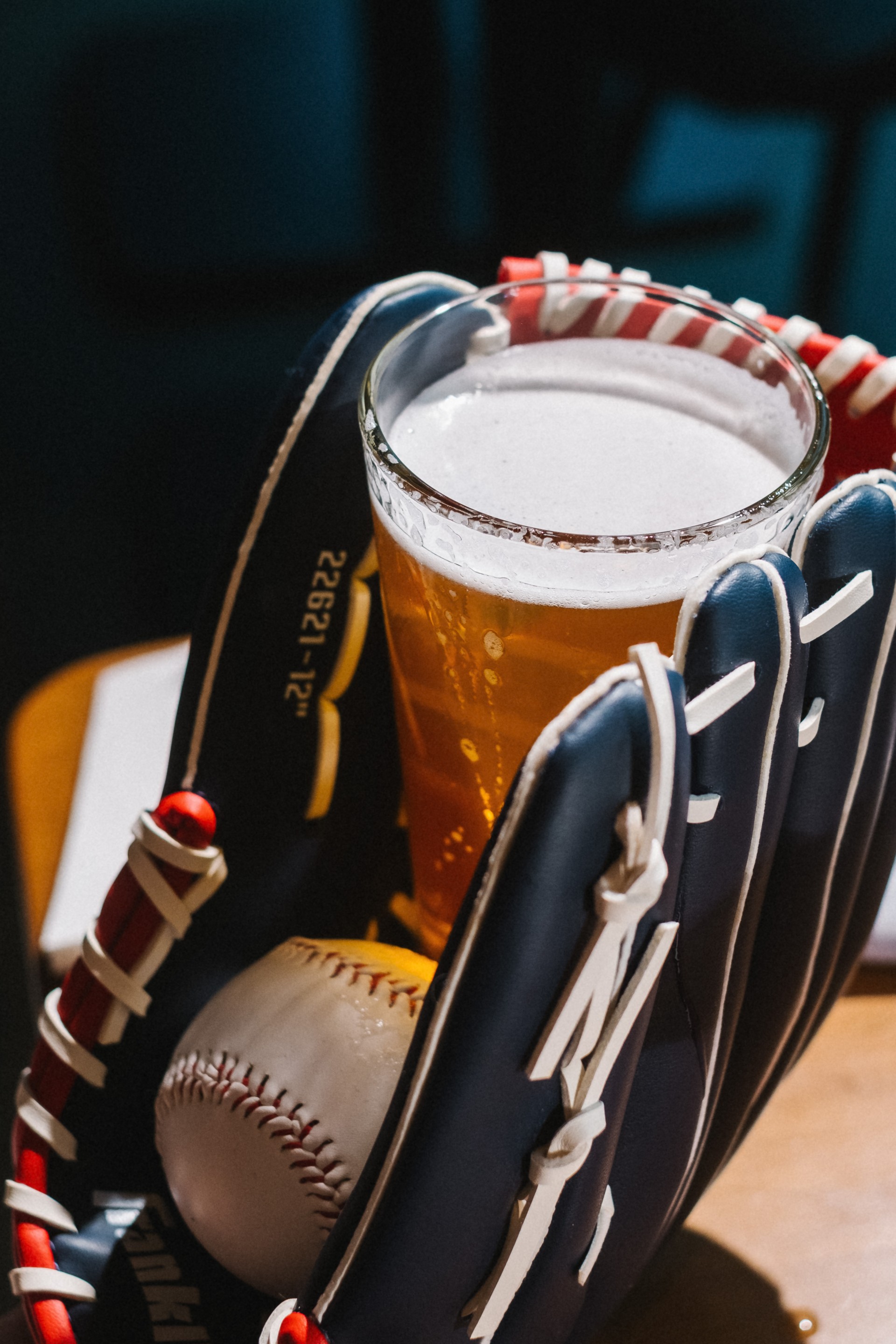 a baseball glove and a glass of beer downtown indianapolis