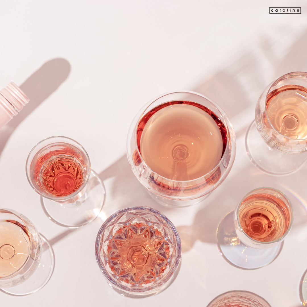 a group of glasses of wine