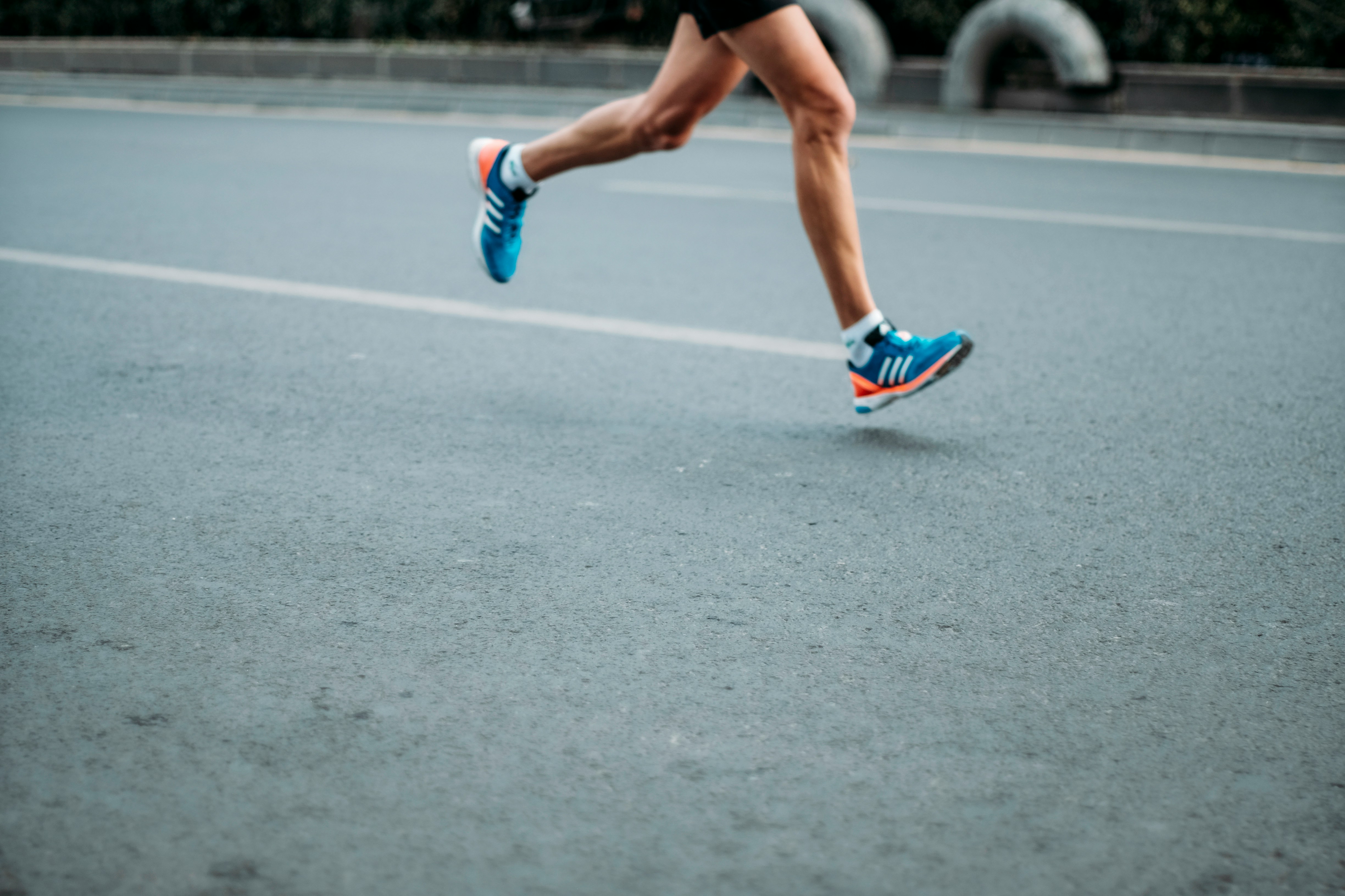 a person running on the road